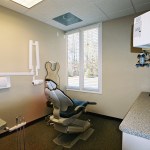 Patient room with dental chair and equipment